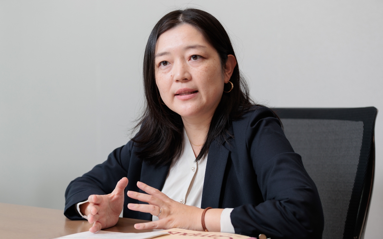 Photo of FUKAYA Satoko, Director, Division 3, Energy Solutions Finance Department, Energy and Natural Resources Finance Group, goes back to 2019 to explain the background of this project.