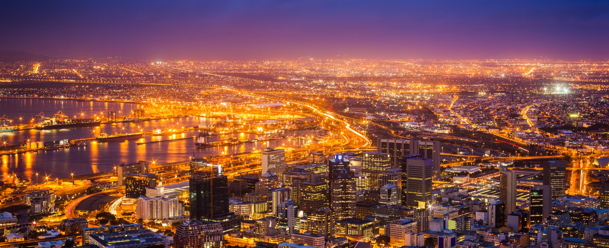 Photo of Cape Town at night, South Africa—illuminated by progress, the city’s light symbolizes Africa’s unfolding future.